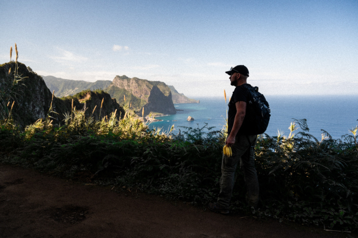 Silhouette of Christoph, the coastal landscape of Madeira island in the background